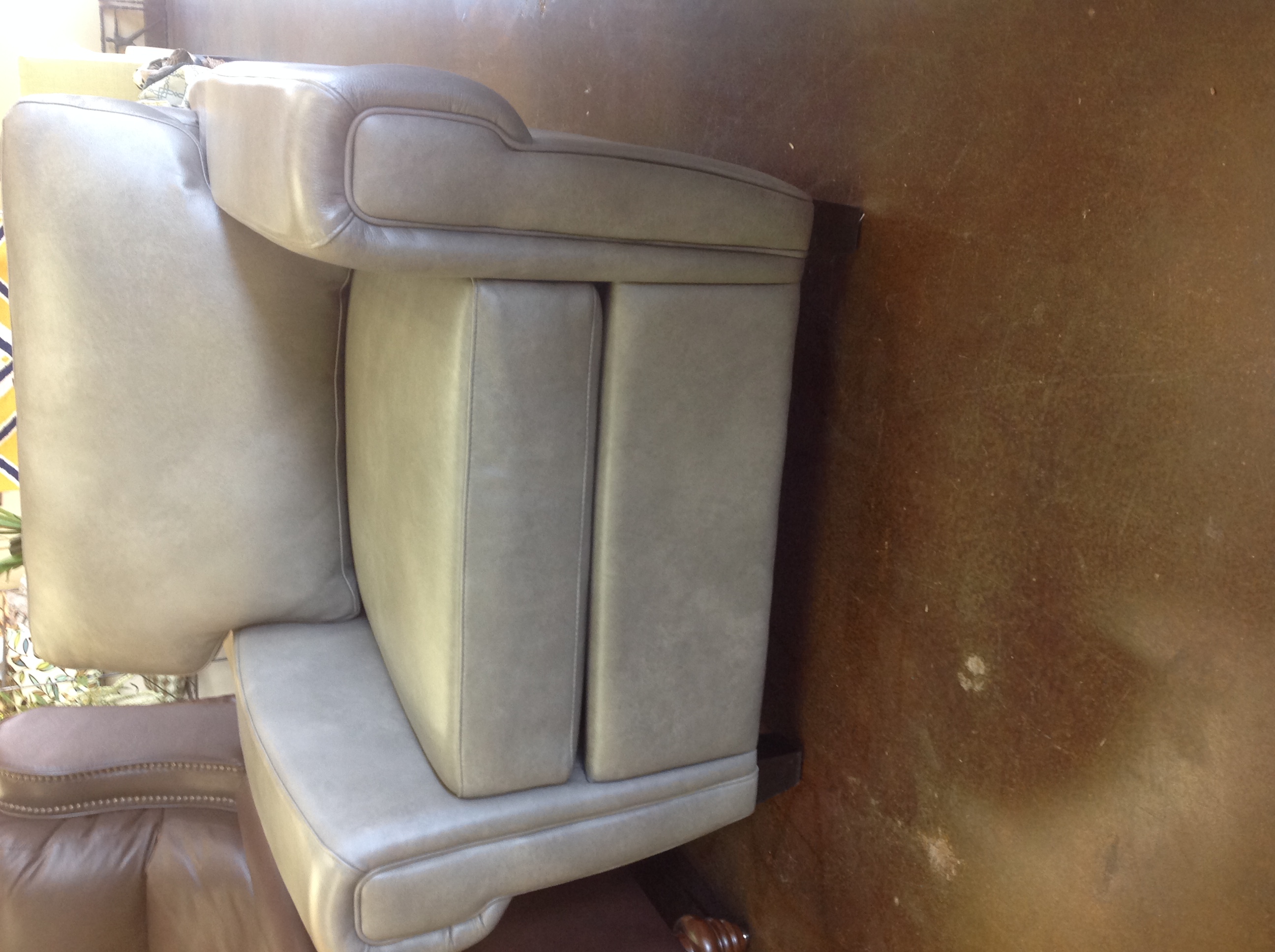 Stationary Solutions key arm leather chair