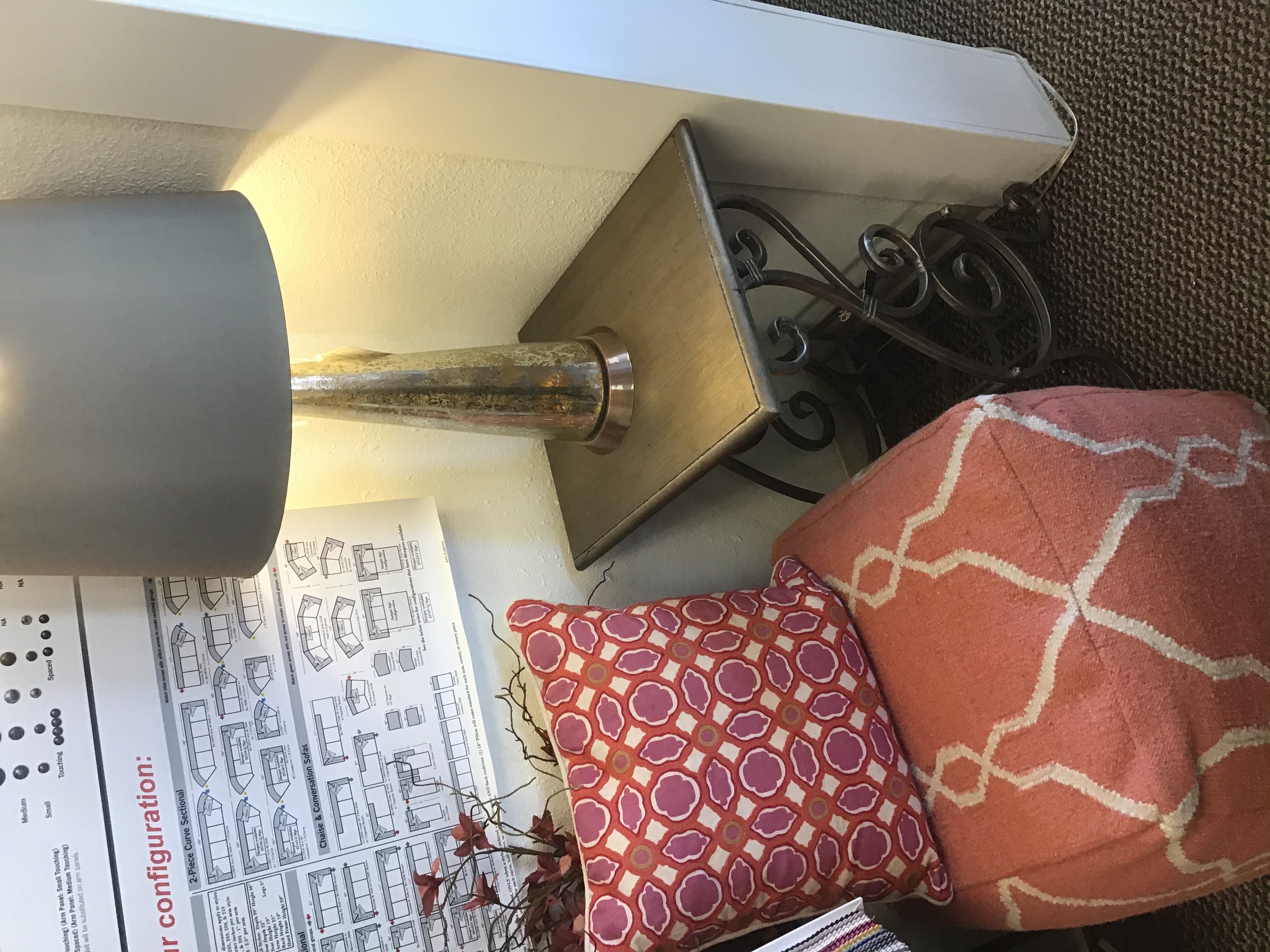 poof, pillows ,small side table,lamp